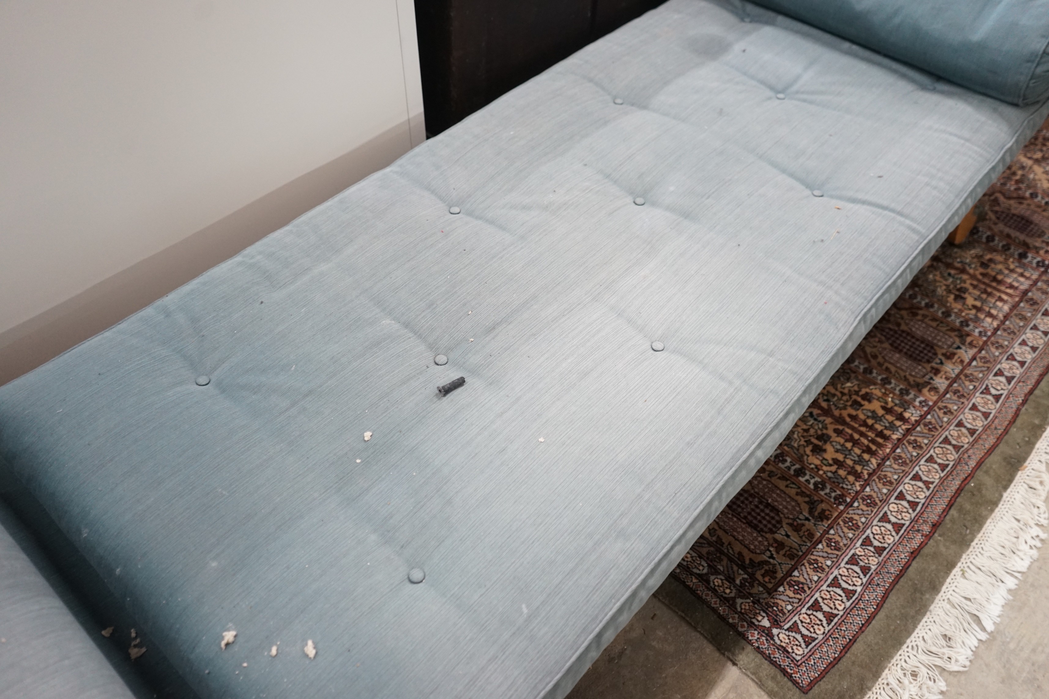 A Biedermeier style gilt metal mounted birch scroll end day bed, length 238cms, depth 75cms, height 73cms.